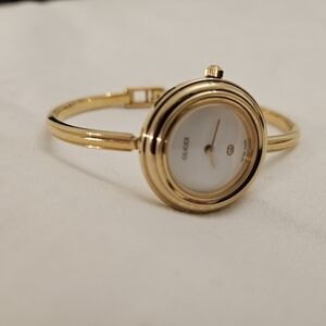 Gucci Gold and White Minimalist Watch